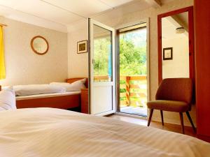 Ένα ή περισσότερα κρεβάτια σε δωμάτιο στο Ferienhaus Nicklas +3 φωτογραφίες