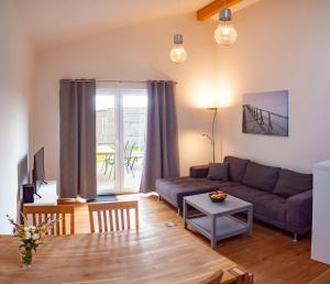 Posezení v ubytování Ferienhaus Rüno II