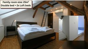 Postel nebo postele na pokoji v ubytování ATIK ROOMS