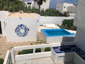 Gallery image of La Maison du Pêcheur Villa et Studio pied dans l'eau in Banī ‘Aţāʼ +17 photos