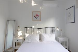 Postel nebo postele na pokoji v ubytování Villa Conel