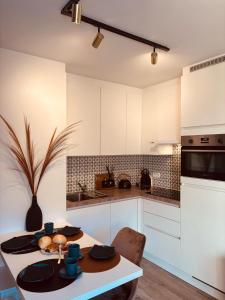 Η κουζίνα ή μικρή κουζίνα στο Duynenhuys 0101