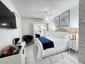 Ένα ή περισσότερα κρεβάτια σε δωμάτιο στο Best of Bom Retiro-Tiradentes Metro apt 20
