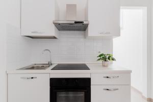 Salento Vibes Apartments - Salento Selection的厨房或小厨房