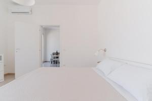 Salento Vibes Apartments - Salento Selection客房内的一张或多张床位