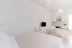 Salento Vibes Apartments - Salento Selection客房内的一张或多张床位