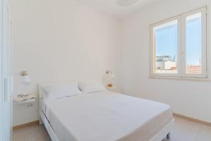Salento Vibes Apartments - Salento Selection客房内的一张或多张床位