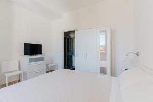 Salento Vibes Apartments - Salento Selection客房内的一张或多张床位
