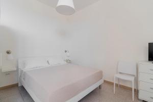 Salento Vibes Apartments - Salento Selection客房内的一张或多张床位