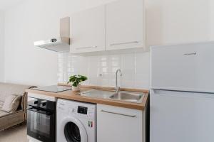 Salento Vibes Apartments - Salento Selection的厨房或小厨房