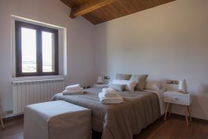 Postel nebo postele na pokoji v ubytování Casa Cal Saboya