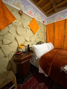 Postel nebo postele na pokoji v ubytování Auberge IMIN TAGHYA