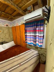 Postel nebo postele na pokoji v ubytování Auberge IMIN TAGHYA