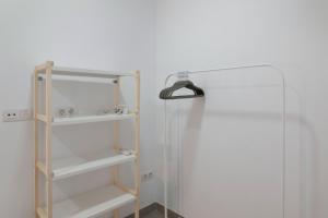 a bathroom with a shower and a glass door at Garden Terrace House - La Isleta in Guanarteme +29 photos