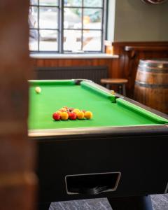 Uma mesa de bilhar em JJs Lodge Ebor