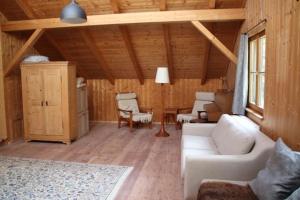 Χώρος καθιστικού στο Hütte am Chiemsee
