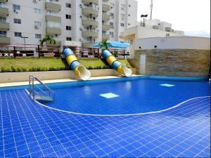 Bazén v ubytování LAGOA QUENTE FLATS nebo v jeho okolí + 8 fotografií