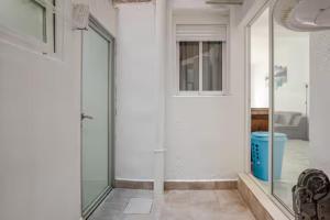 Posteľ alebo postele v izbe v ubytovaní Apartamento en Planta Baja Cerca de la Playa en Badalona