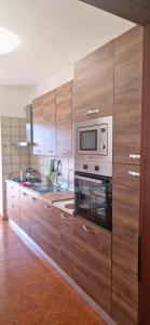 A kitchen or kitchenette at Casa Stazione Magliana