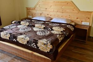 Postelja oz. postelje v sobi nastanitve Nomadic Den Manali