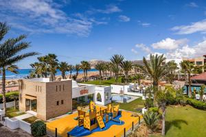 an aerial view of a resort with a playground at Hotel Riu Palace Tikida Agadir - All Inclusive in Agadir