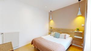Кровать или кровати в номере Hotel Solara