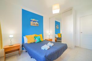 En eller flere senge i et værelse på Oasis Nature by MojeHoliday