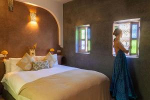 Postel nebo postele na pokoji v ubytování Riad 10 Mandarin BOUTIQUE RIAD