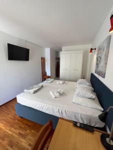 Postel nebo postele na pokoji v ubytování Apartments Šuda