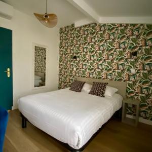 Кровать или кровати в номере Hotel Solara