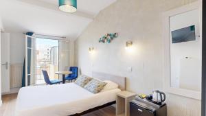Кровать или кровати в номере Hotel Solara