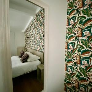Кровать или кровати в номере Hotel Solara