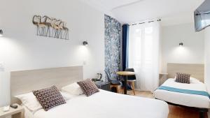 Кровать или кровати в номере Hotel Solara