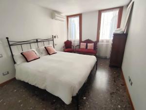 Postel nebo postele na pokoji v ubytování Ca Rialto Apartment