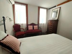 Postel nebo postele na pokoji v ubytování Ca Rialto Apartment