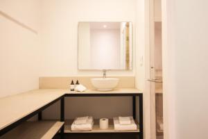 Katil atau katil-katil dalam bilik di Hotel B10 - Distinctive Hotel-