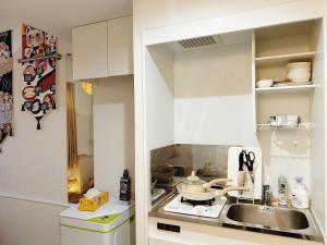 Η κουζίνα ή μικρή κουζίνα στο Shin-Koenji loft apartment close to Tokyo Metro14mins to Shinjuku +3 φωτογραφίες
