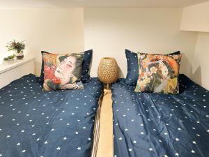 Ένα ή περισσότερα κρεβάτια σε δωμάτιο στο Shin-Koenji loft apartment close to Tokyo Metro14mins to Shinjuku