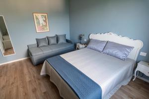 Postel nebo postele na pokoji v ubytování LE CAMERE DI MARIO
