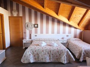 Postel nebo postele na pokoji v ubytování Made in Italy