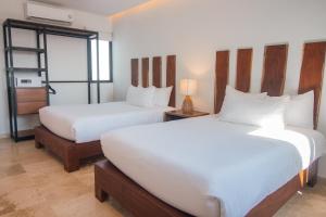 Katil atau katil-katil dalam bilik di Hotel B10 - Distinctive Hotel-
