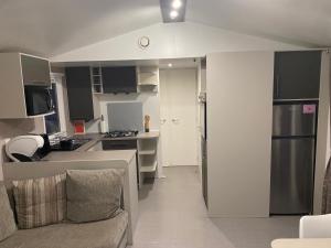 Kuchyň nebo kuchyňský kout v ubytování Mobil Home Dalhias 1