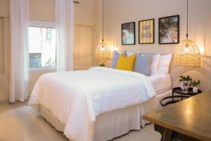 Cama ou camas em um quarto em Magnolia Inn