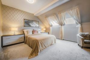 Postel nebo postele na pokoji v ubytování Málnaliget Rendezvényház + 55 fotografií