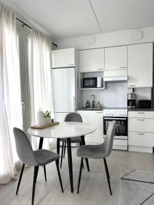 ครัวหรือมุมครัวของ Foliate Living Taimi