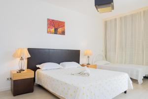Postel nebo postele na pokoji v ubytování Kriol Guest House + 29 fotografií