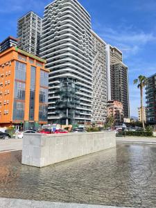 a group of tall buildings in a city at Sunny Spot Batumi in Batumi