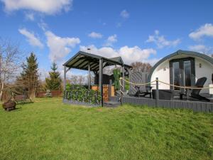 a playground in a yard with a dome at Cherry Pod in Shrewsbury