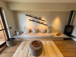 a bedroom with a bed with a cross on the wall at Breva's Flat near Bellagio in Bellagio