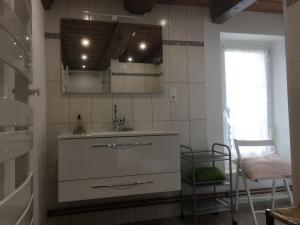 a kitchen with a sink and a counter top at Maison typique lorraine dans une ancienne ferme - FR-1-584-376 in Grand-Failly
